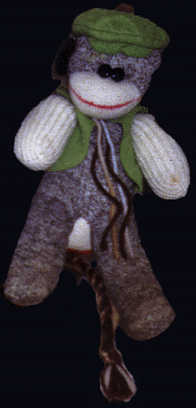 Sock monkey wearing vest 74K GIF