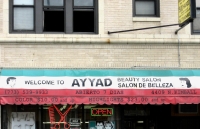 Ayyad Beauty Salon, Kimball near Montrose, Chicago. Ayyad is still operating as of 2024, but these signs are gone.