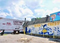 Everything Excellent, 45th Street and Cottage Grove, adjacent to Golden Fish. Still there as of 2024.