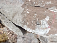 Wally + Chris. Chicago lakefront stone carvings, Calumet Park. 2019