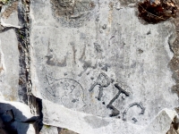 Anime-ish profile (or maybe a fish) 89, R.T.G. Chicago lakefront stone carvings, Calumet Park. 2019