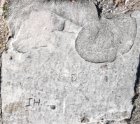 DC, J.H, T, E. Chicago lakefront stone carvings, Calumet Park. 2024