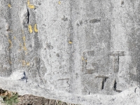 GT, TL, I, M. Chicago lakefront stone carvings, Calumet Park. 2024