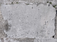 Autograph rock: Peg, Jim D, Jon C., Connie, others. Chicago lakefront stone carvings, Calumet Park. 2024