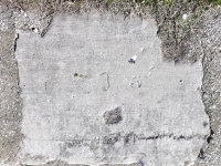 J, ME. Chicago lakefront stone carvings, Calumet Park. 2024