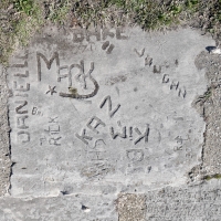 Autograph rock: Danielle, Bill, OHRE 71, Mark, Tim, RIck, Kaz, Kim, Vaughn, Shar, BRI, Tim, Rof, stars. Chicago lakefront stone carvings, Calumet Park. 2024