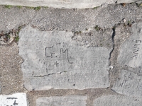 G.M. +, Kat and others. Chicago lakefront stone carvings, Calumet Park. 2024