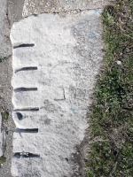 JO, J, JJL and others. Chicago lakefront stone carvings, Calumet Park. 2024