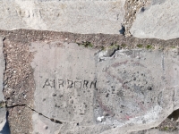 Airborn, J, JI. Chicago lakefront stone carvings, Calumet Park. 2024