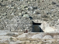 Hillside produce storage. The pipes are vents. No refrigeration needed.