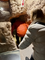 Entering a tight fit. Kaymakli underground city.