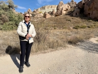 Janet at the Zelve Open Air Museum, a UNESCO site with former cave dwellings, chapels and more.