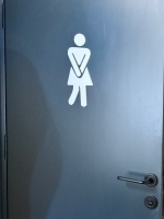 Women's room symbol.