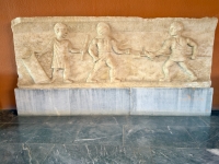 Gladiator fight with referee, Ephesus Museum.