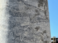 Pillar with gladiatorial graffiti, Perge. This figure is said to represent the patron of the show. More gladiators to the right.