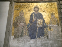 Hagia Sophia. Jesus, sitting on the throne, Emperor Constantine IX Monomachos on the left and Empress Zoe on the right. 11th century.