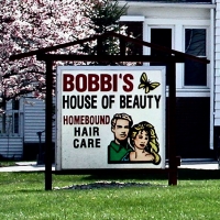 Not a mansard sign, but in the same spirit. An abstracted architectural essence. Bobbi\'s House of Beauty. Crown Point, Indiana, 2003.