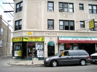 Ayyad Beauty Salon, Kimball near Montrose, Chicago. Ayyad is still operating as of 2024, but these signs are gone.