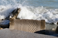 Checkerboard falling into the lake. Chicago lakefront stone carvings, between 45th Street and Hyde Park Blvd. 2021