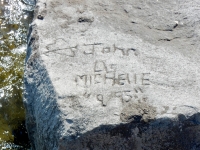 Heart with arrow, John L/S Michelle "9/95." Chicago lakefront stone carvings, between 45th Street and Hyde Park Blvd. 2019