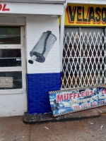 This Velasquez muffler shop is on Elston Avenue on Chicago's  northwest side