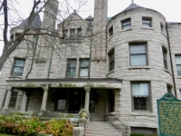 Torrent House, Muskegon, Michigan. The plaque reads: This thirty-one room mansion, built for $250,000 in 1891-92, was the home of John Torrent (1833-1915), pioneer lumberman, alderman, justice of the peace and Muskegon mayor for three terms. A successful entrepreneur, Torrent owned shingle, saw and lumber mills in Muskegon. Manistee, Ludington, Whitehall, Traverse City and Sault Ste. Marie, equipping them all with the most modern machinery. Over the years, this structure also housed a mortuary, hospital and the local Red Cross headquarters. In 1972 the city purchased the house to prevent its demolition.