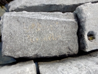 Norm + D, Pete. Chicago lakefront stone carvings, Rainbow Beach. 2019