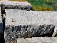 R.B.J. + W.B.H., EB. Chicago lakefront stone carvings, Rainbow Beach jetty. 2022