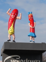 Higher prices and no Vienna dogs, but swell architecture, car service, and those figures have made Superdawg on Milwaukee Avenue at Devon Chicago