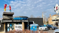 Higher prices and no Vienna dogs, but swell architecture, car service, and those figures have made Superdawg on Milwaukee Avenue at Devon Chicago