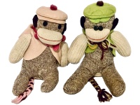 Sock monkeys in caps and vests