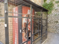 Caged soda machine, the ancient Roman theater in Orange